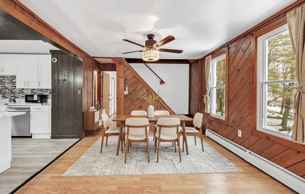 Dining area staged with modern table and chairs